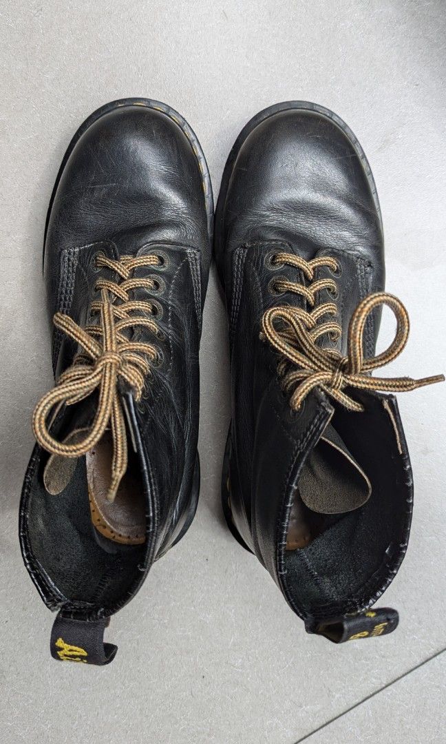 Dr. Martens original - Made in England (Category: Boots) located in Pasig City. Submitted by tessiegc (Listing ID 1331604910, Image 2). Description: 8 holes-high, classic Doc Martens. Made originally in England. All original. Size 8 for Men. I am female and this is the only size that fits my foot length. Sadly too heavy for me. This has been cared for with leather conditioner even when stored. Please be mindful of the small cracks on the trim. ot
