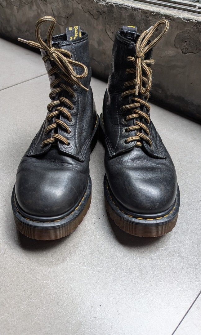 Dr. Martens original - Made in England (Category: Boots) located in Pasig City. Submitted by tessiegc (Listing ID 1331604910, Image 1). Description: 8 holes-high, classic Doc Martens. Made originally in England. All original. Size 8 for Men. I am female and this is the only size that fits my foot length. Sadly too heavy for me. This has been cared for with leather conditioner even when stored. Please be mindful of the small cracks on the trim. ot