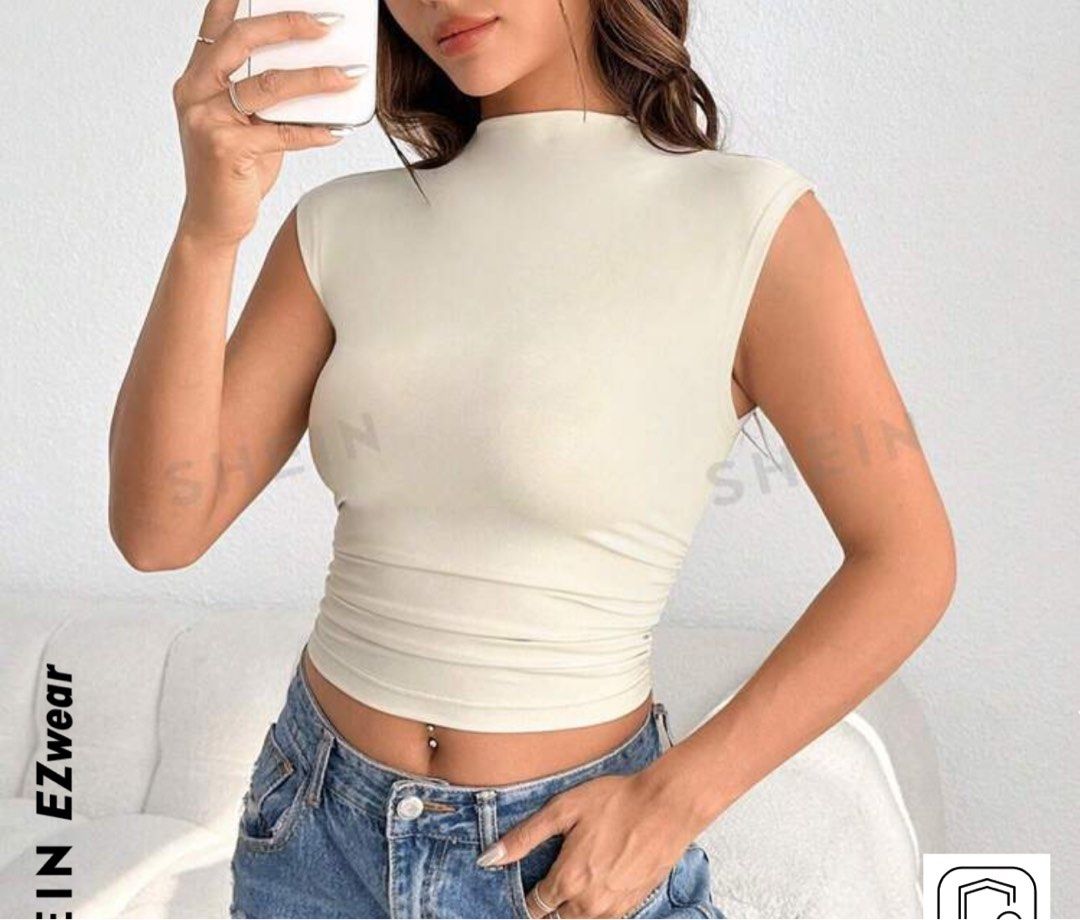FUNNEL NECK RUCHED TANK TOP (Category: Others Tops) located in Manila. Submitted by cookie.declutter (Listing ID 1331696109, Image 2). Description: - not my color.