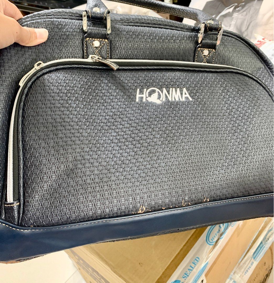 Golf Bag Honma Boston Bag Duffle Bag (Category: Golf) located in Cavite. Submitted by vieanner (Listing ID 1331601897, Image 3). Description: Brand New Honma Bag - Never Used This bag has never been used, but it has been in storage for some time. As a result, there are minor imperfections, specifically some wear on the exterior. These flaws are purely cosmetic and do not affect the bag’s functionality or overall quality. Please refer to the photo
