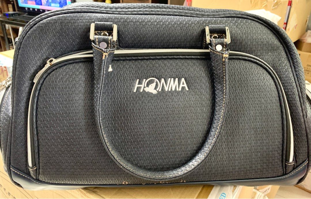 Golf Bag Honma Boston Bag Duffle Bag (Category: Golf) located in Cavite. Submitted by vieanner (Listing ID 1331601897, Image 2). Description: Brand New Honma Bag - Never Used This bag has never been used, but it has been in storage for some time. As a result, there are minor imperfections, specifically some wear on the exterior. These flaws are purely cosmetic and do not affect the bag’s functionality or overall quality. Please refer to the photo