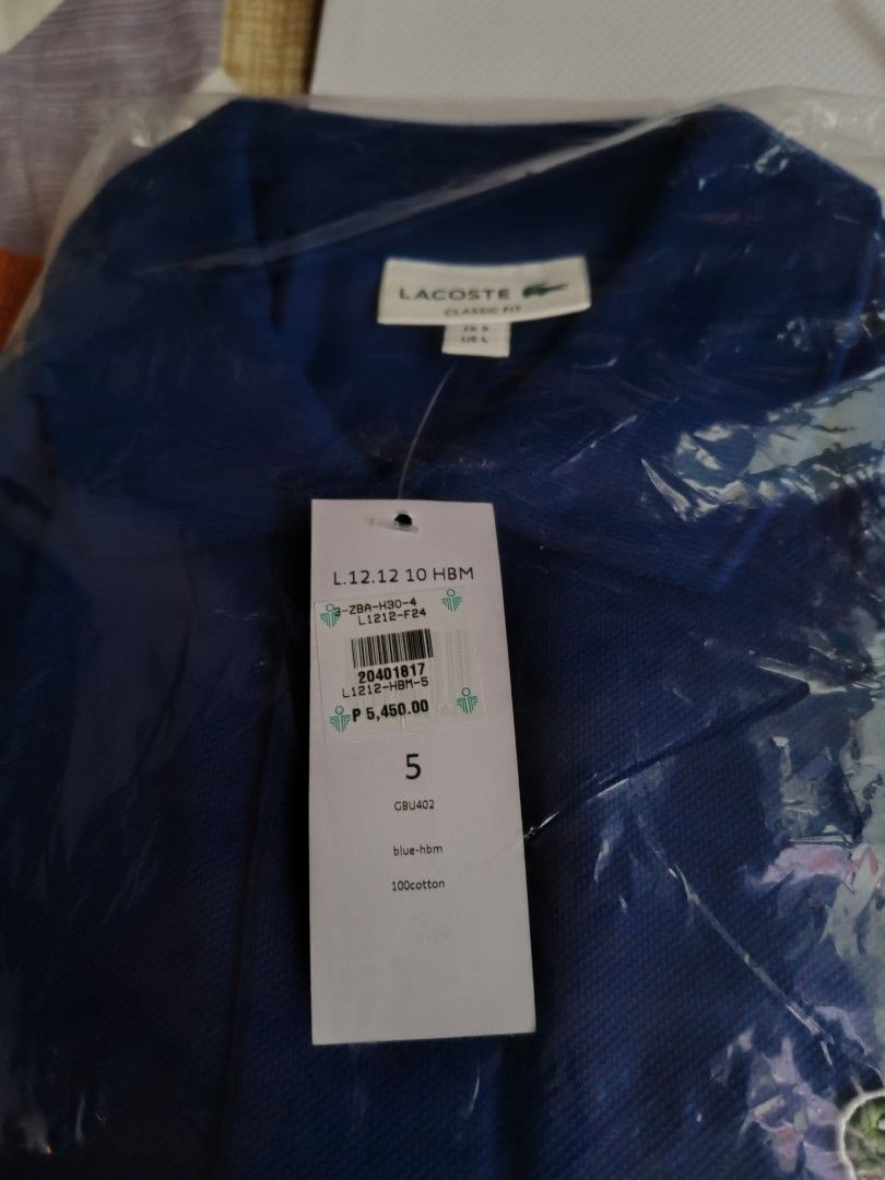 Lacoste Men's polo shirt (Category: Tshirts & Polo Shirts ) located in Manila. Submitted by kickshoeph (Listing ID 1331589104, Image 2). Description: Size: L fitted to medium size men 100% authentic buy from lacoste store with receipt.