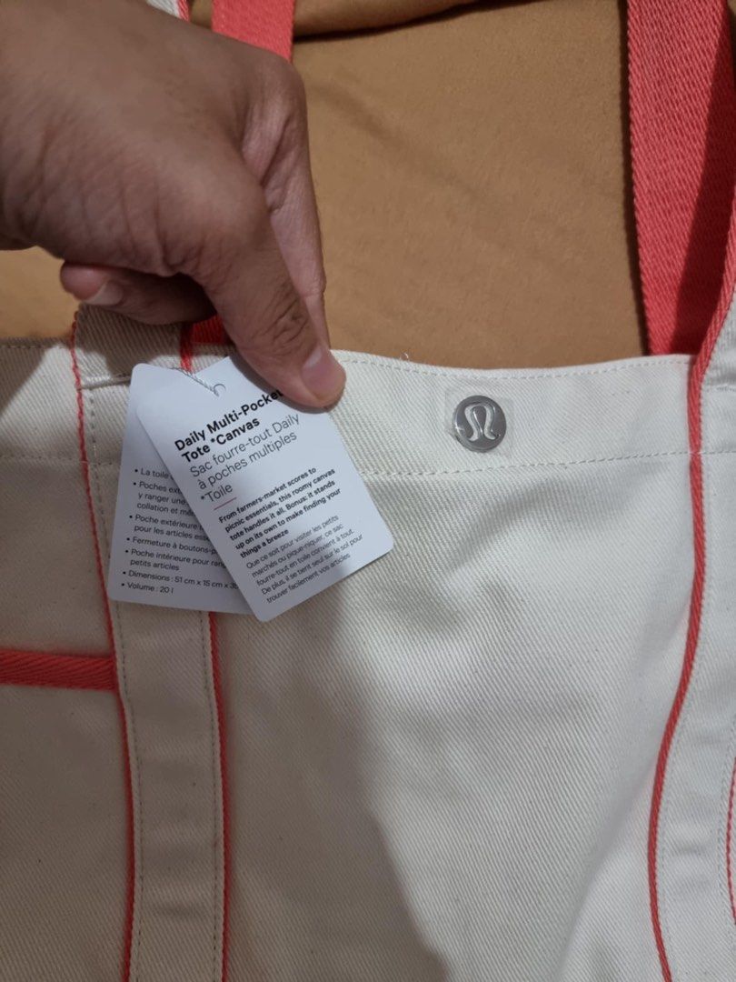 Lululemon daily multi pocket tote canvas bag (Category: Tote Bags) located in Antipolo. Submitted by cmss1998 (Listing ID 1331684340, Image 2). Description: Lululemon daily multi pocket tote canvas bag With original lululemon plastic amd tag ORIGINAL Pwede ipang regalo Brand new Tote bag 20 liters .