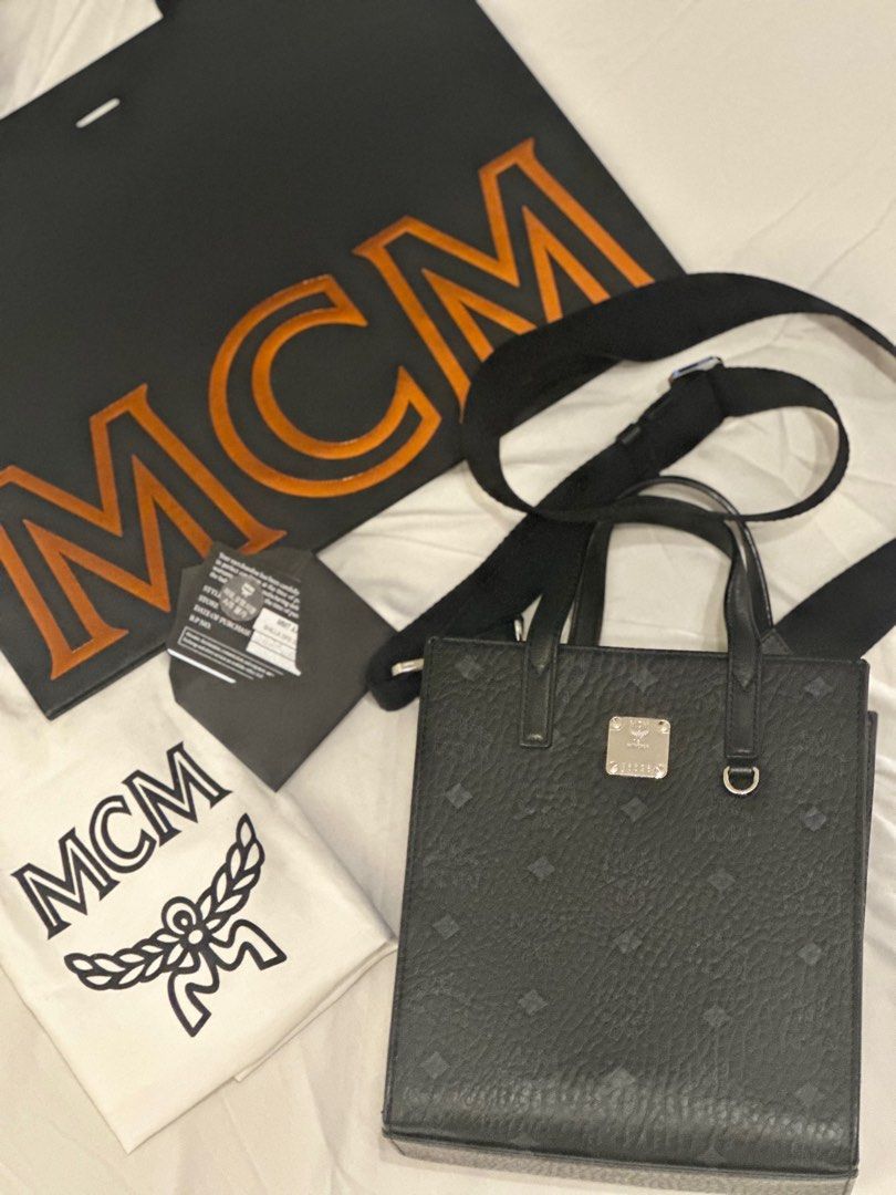 MCM Aren Mini Tote Bag (Black) - Authentic (Category: Luxury Bags & Wallets) located in Pasig City. Submitted by phaethrikh (Listing ID 1331658939, Image 1). Description: MCM Aren Mini Tote Bag (Black) - Authentic - Comes with Paper Bag, Dust Bag, Purchase Card.