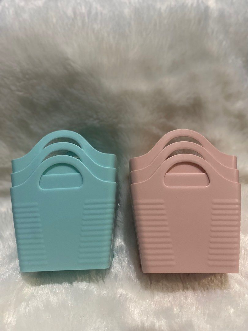 storage basket (Category: Storage Boxes & Baskets) located in San Fernando. Submitted by erin_shop (Listing ID 1331602467, Image 2). Description: Plastic Home Storage Bins/Basket Color available: Blue&Pink 350 fo 6 60 pesos each.