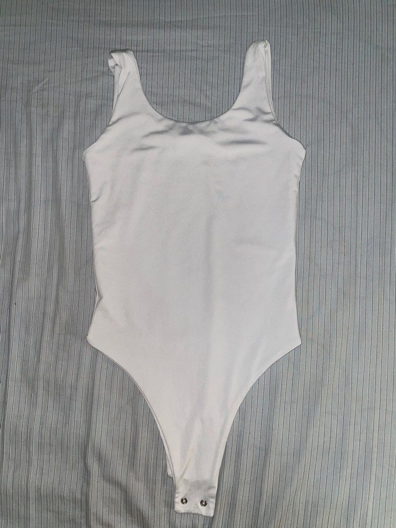 White Body Suit (Category: Others Tops) located in Malabon City. Submitted by krishaaec (Listing ID 1331671369, Image 2). Description: - doesn’t fit me anymore - nice fit .