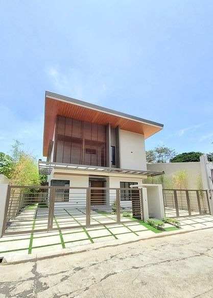 BF Homes Brand New Modern House with Pool (Category: House & Lot) located in Manila. Submitted by mariaelena.npacunayen (Listing ID 1328604209, Image 2). Description: Brand New House with Pool Modern Two Storey Lot Size 280 sqm Floor 400 sqm Single Detached Five Bedrooms with Four Toilet and Bath Four Car Garage His and Hers Walk In Closet 12 Feet High Ceiling Kohler Bathroom Fixtures Maid's and Driver's Room with Toilet and Bath Swimming Pool P4