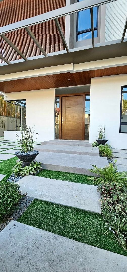 BF Homes Brand New Modern House with Pool (Category: House & Lot) located in Manila. Submitted by mariaelena.npacunayen (Listing ID 1328604209, Image 3). Description: Brand New House with Pool Modern Two Storey Lot Size 280 sqm Floor 400 sqm Single Detached Five Bedrooms with Four Toilet and Bath Four Car Garage His and Hers Walk In Closet 12 Feet High Ceiling Kohler Bathroom Fixtures Maid's and Driver's Room with Toilet and Bath Swimming Pool P4