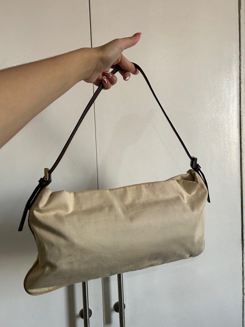 Fendi Baguette / Kili kili bag (Category: Luxury Bags & Wallets) located in Quezon City. Submitted by bagsonly2000 (Listing ID 1328659729, Image 2). Description: With minimal dirt stain infront Guaranteed Auth pm for more pics.