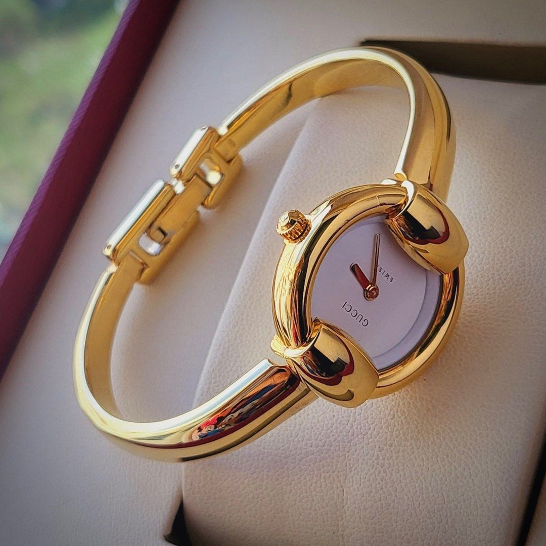 Gucci gold bangle watches ladies on sale