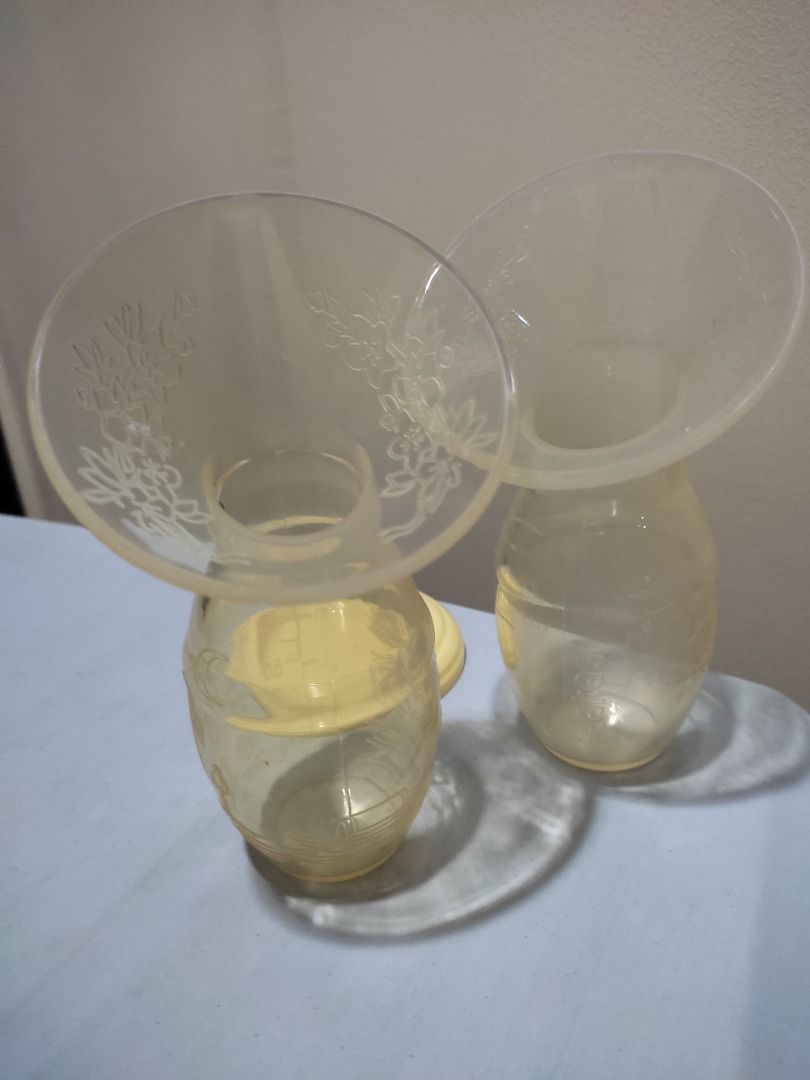 Hakaa milk catcher, silicone breast pump (Category: Breastfeeding & Bottle Feeding) located in Quezon City. Submitted by PaycesCorner (Listing ID 1328753926, Image 1). Description: Take all for 380. Include: ✳️ 1 original Hakaa brand pump with lid ✳️ 1 generic brand hakaa like pump without lid. Individually - Haaka with lid @ 300 pesos - Generic with no lid @ 120 pesos Shipping from South Caloocan Monumento area. GCash payment, payment first befo