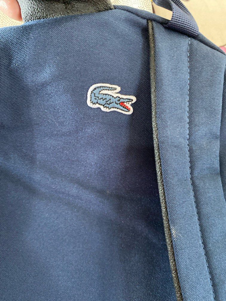 Lacoste bagpack (Category: Backpacks) located in Antipolo. Submitted by jlonline_1207 (Listing ID 1328545849, Image 3). Description: Bagpack Blue Large size.