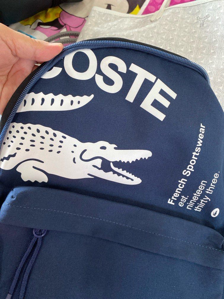 Lacoste bagpack (Category: Backpacks) located in Antipolo. Submitted by jlonline_1207 (Listing ID 1328545849, Image 2). Description: Bagpack Blue Large size.
