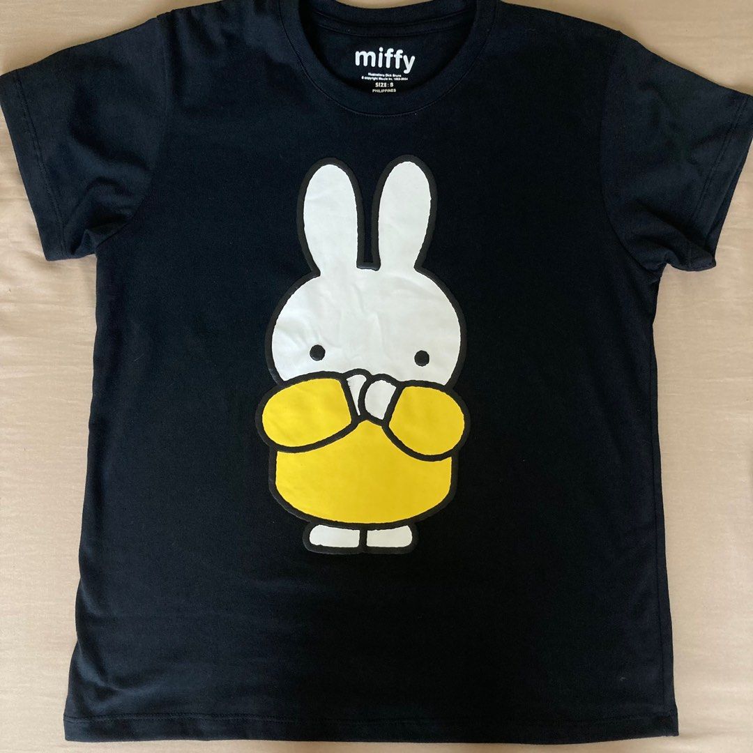 Official Miffy Black Shirt (Category: Shirts) located in Marikina City. Submitted by mlffy (Listing ID 1328616438, Image 1). Description: 🐇 Authentic Miffy by Dick Bruno Merchandise Black Shirt 🏷️ Size S on tag, best fit XS-S womens 🧡 Brand new, RFS bought 2 sizes and picked the size M. 👛 GCash.