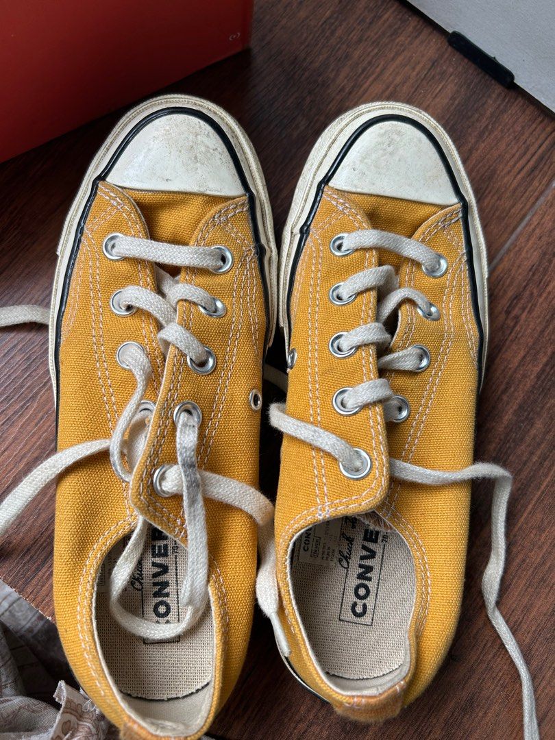 Dark yellow converse store
