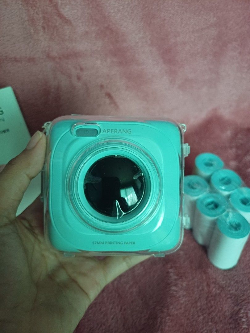PAPERANG PRINTER (FOR TAKE ALL) (Category: Printers, Scanners & Copiers) located in Cavite. Submitted by gonjane427 (Listing ID 1328638079, Image 2). Description: Paperang P1 Printer like new (slightly used) no issue ( yes no issue) color: Mint Green ( color may vary due to lighting but it's mint grin) portable can print black & white pic ( see photo) can print notes and list can print receipt (you can customize what you want to print) what you c