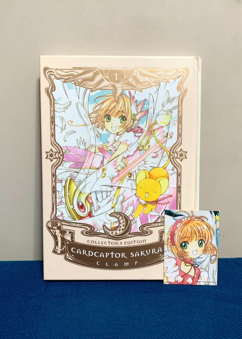 SET! Cardcaptor Sakura Collector's Edition by CLAMP (Volumes 1 - 4) (Category: Comics & Manga) located in San Juan City. Submitted by optberries (Listing ID 1328691663, Image 3). Description: Cardcaptor Sakura Collector's Edition (Volumes 1 - 4) - Very good condition! - Selling as a SET (4 volumes) - Hardbound - Includes exclusive Clow Card collectible (per volume).