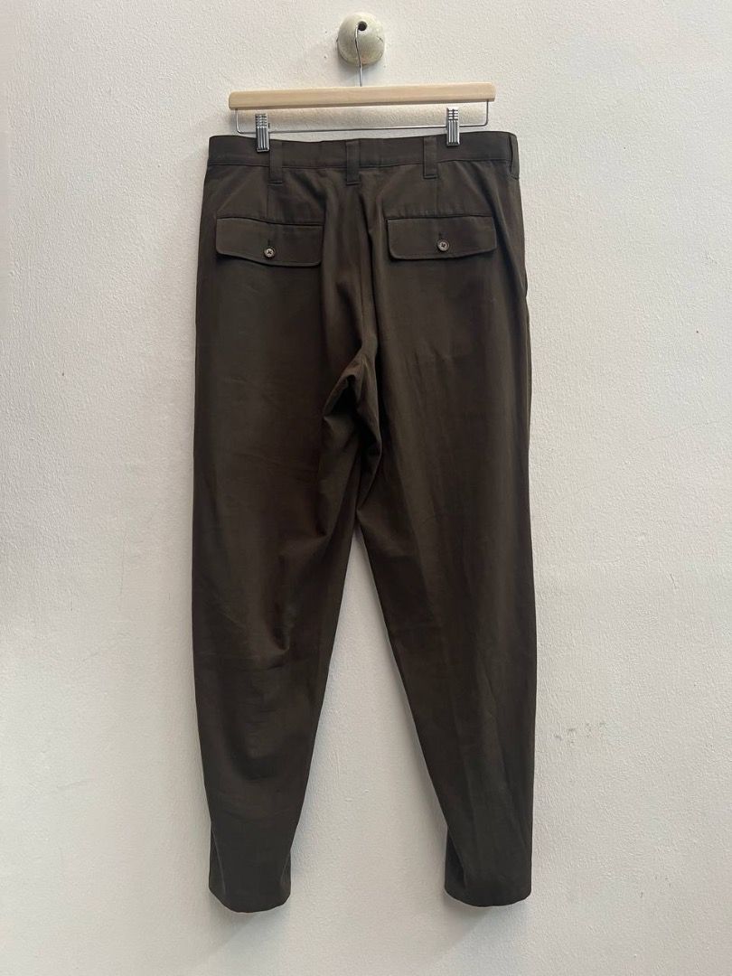 SS08 Yohji Yamamoto Pour Homme Front Zip Cargo Pants (Category: Trousers) located in Singapore. Submitted by upstairsgarments (Listing ID 1328753972, Image 3). Description: For Spring/Summer 2008, Yohji Yamamoto presented a vivid narrative that offered a glimmer of hope amidst the inevitability of warfare. The collection appears to be centered around a soldier's homecoming, expressed with a tinge of serene optimism and a desire for freedom. The s