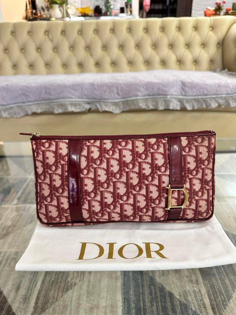 Authentic Christian Dior clutch bag (Category: Luxury Bags & Wallets) located in Quezon City. Submitted by jhaediah (Listing ID 1331752002, Image 1). Description: - Authentic 💯 - Christian Dior clutch bag - Inclusion: with provided dustbag and original paper bag - Small size .