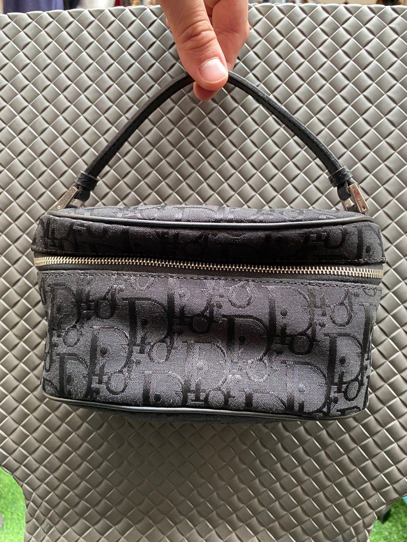 AUTHENTIC Dior Black Oblique Top Handle Mini Vanity (Category: Luxury Bags & Wallets) located in Quezon City. Submitted by closetofcoco (Listing ID 1331770406, Image 1). Description: GUARANTEED AUTHENTIC PM FOR INQUIRIES NO LOW BALLING.
