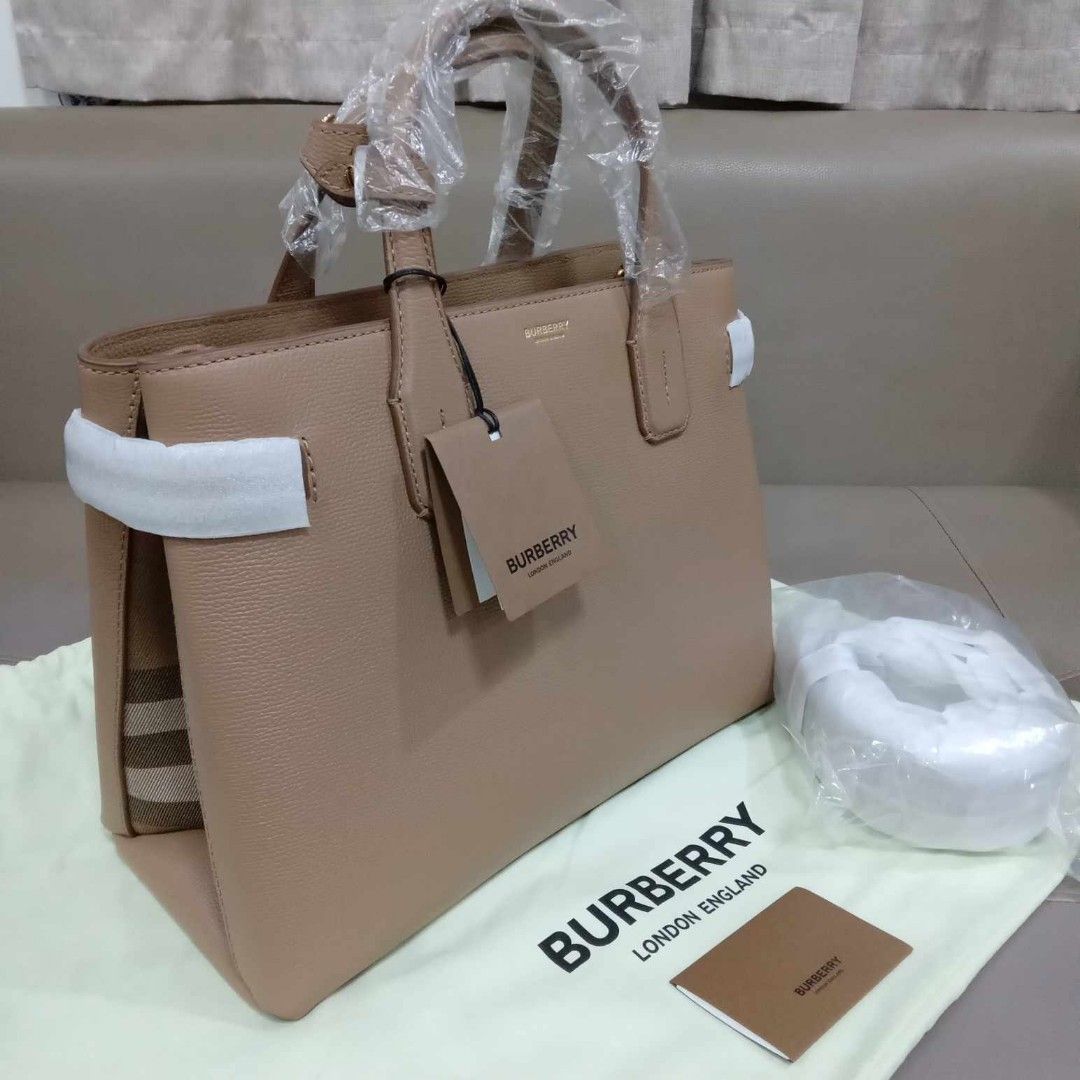 Burberry MD Banner Two Way Bag (Category: Luxury Bags & Wallets) located in Taguig. Submitted by esa.agustin (Listing ID 1331799454, Image 2). Description: Original Burberry MD Banner two way leather bag. Color is Camel. Complete inclusion ( dust bag, strap, tag and carecard)..