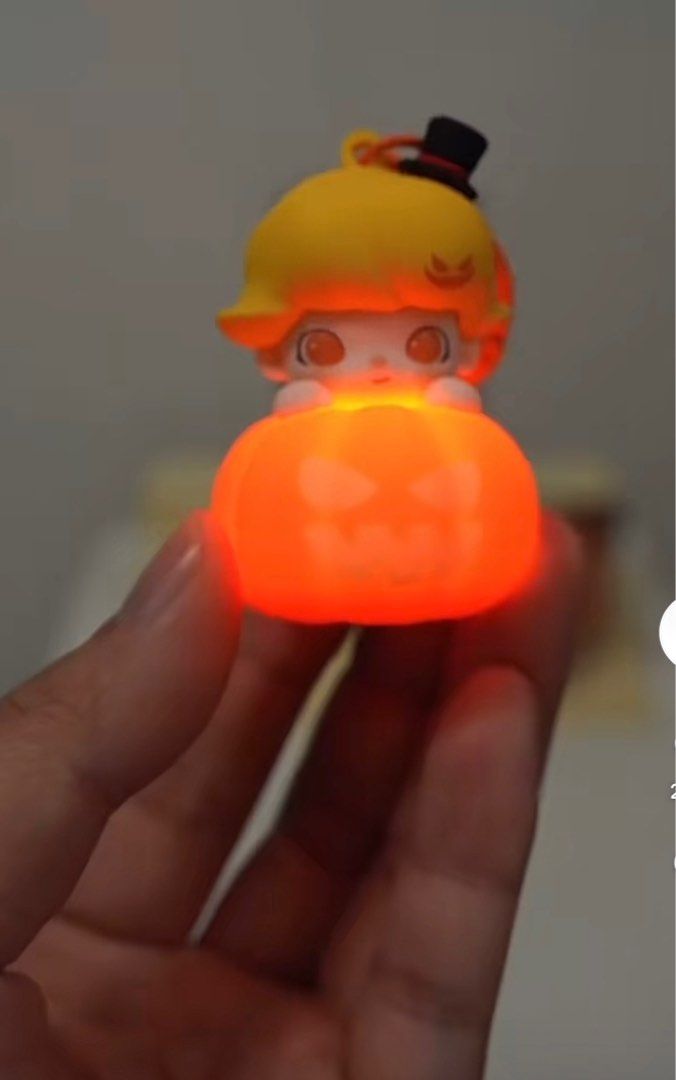 DIMOO Luminous pumpkin pendant (Category: Designer & Blind Box Toys) located in Calamba. Submitted by zarahzion (Listing ID 1331753152, Image 1). Description: DIMOO Luminous pumpkin pendant OG FROM POPMART TAIWAN TAIPEI Sealed🚨💯.