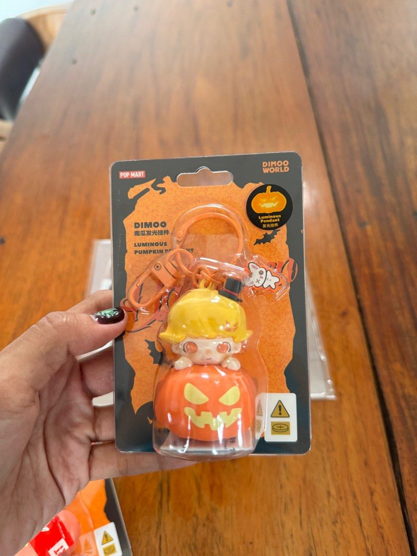 DIMOO Luminous pumpkin pendant (Category: Designer & Blind Box Toys) located in Calamba. Submitted by zarahzion (Listing ID 1331753152, Image 2). Description: DIMOO Luminous pumpkin pendant OG FROM POPMART TAIWAN TAIPEI Sealed🚨💯.