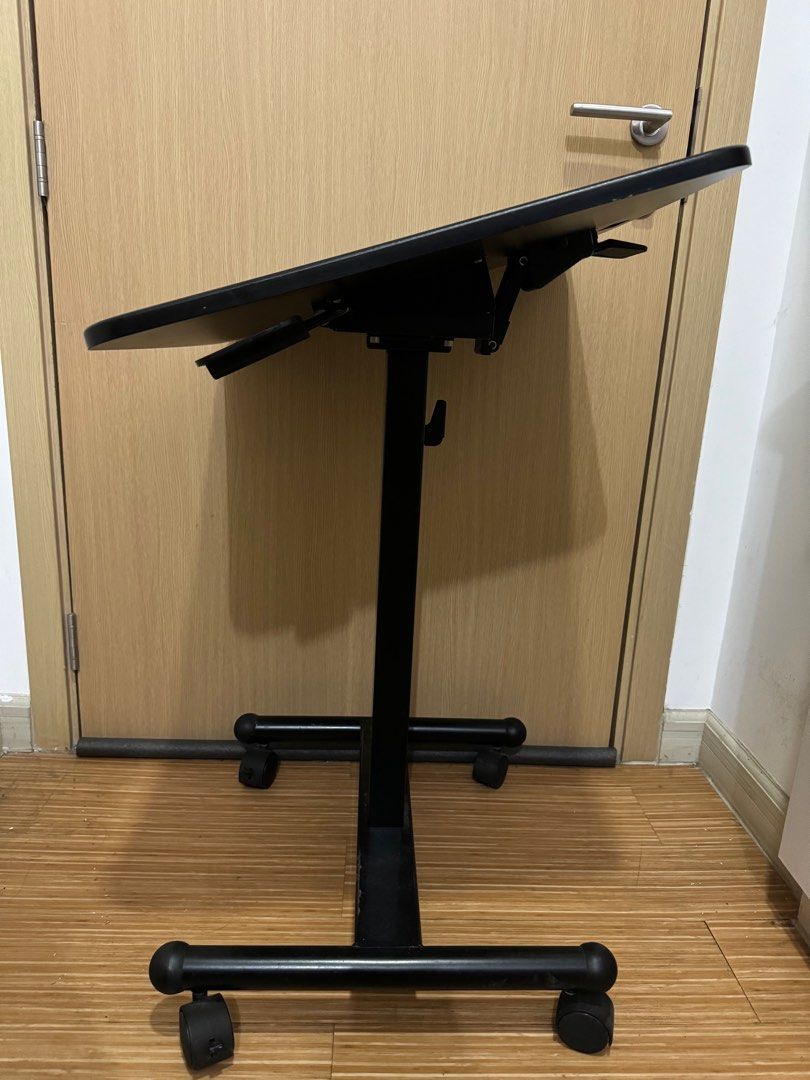 Flexispot Laptop Desk / Computer table / Ergonomic table / Office table / Study table / Game table (Category: Office Furniture & Fixtures) located in Manila. Submitted by thisisev09721 (Listing ID 1331896061, Image 2). Description: 10% off (₱6300) Mobile Desk •flexible for sitting and standing position •can go as high as chest level of a 5’5 person (29.3” to 45”) - perfectly comfortable for standing and when giving meeting presentations/talks •ea