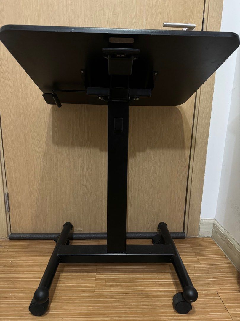 Flexispot Laptop Desk / Computer table / Ergonomic table / Office table / Study table / Game table (Category: Office Furniture & Fixtures) located in Manila. Submitted by thisisev09721 (Listing ID 1331896061, Image 3). Description: 10% off (₱6300) Mobile Desk •flexible for sitting and standing position •can go as high as chest level of a 5’5 person (29.3” to 45”) - perfectly comfortable for standing and when giving meeting presentations/talks •ea
