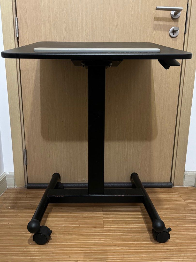 Flexispot Laptop Desk / Computer table / Ergonomic table / Office table / Study table / Game table (Category: Office Furniture & Fixtures) located in Manila. Submitted by thisisev09721 (Listing ID 1331896061, Image 1). Description: 10% off (₱6300) Mobile Desk •flexible for sitting and standing position •can go as high as chest level of a 5’5 person (29.3” to 45”) - perfectly comfortable for standing and when giving meeting presentations/talks •ea