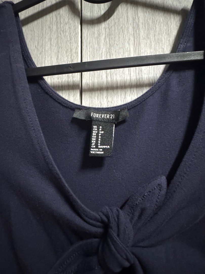 Forever 21 tie front short dress (Category: Dresses) located in Pateros City. Submitted by celle0619 (Listing ID 1331858064, Image 2). Description: Size on tag Bnew but washed Not H&M.