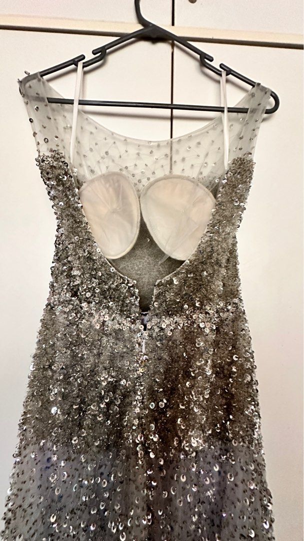 Gray sequin gown (Category: Evening Dresses & Gowns) located in Subang Jaya. Submitted by jedimonster (Listing ID 1304924321, Image 3). Description: Bought this from another carouseller new and accordingly worth almost 1k. I never worn coz no event to go too 😅 Heavy dress, long fish tail and gorgeous. Esp if you love sequins and blinks you will love this. .