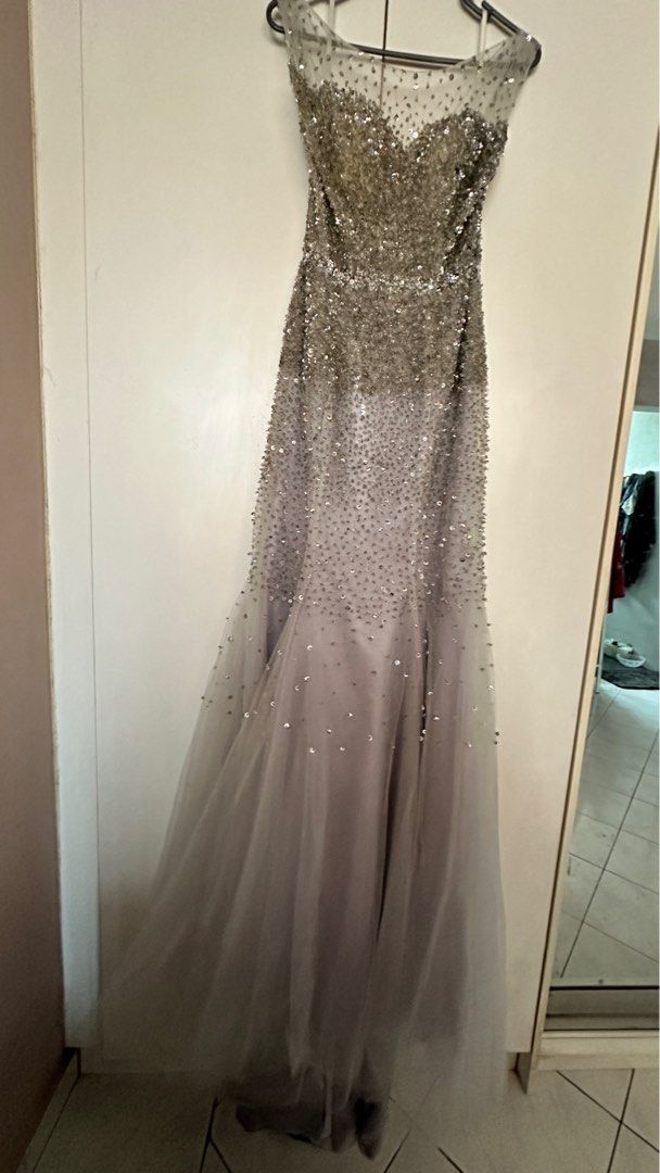 Gray sequin gown (Category: Evening Dresses & Gowns) located in Subang Jaya. Submitted by jedimonster (Listing ID 1304924321, Image 1). Description: Bought this from another carouseller new and accordingly worth almost 1k. I never worn coz no event to go too 😅 Heavy dress, long fish tail and gorgeous. Esp if you love sequins and blinks you will love this. .
