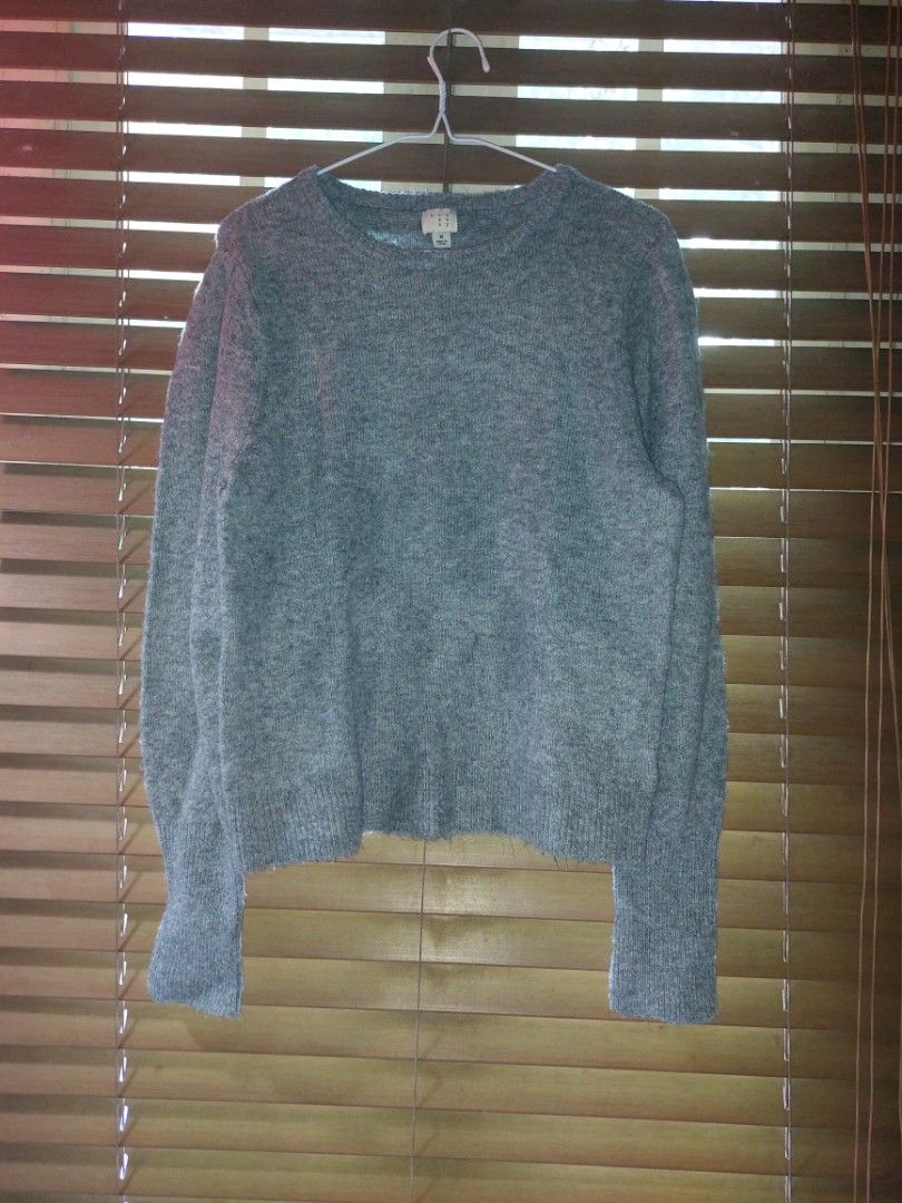 Grey Sweater (Category: Coats, Jackets and Outerwear) located in Makati City. Submitted by drawerph (Listing ID 1331892228, Image 1). Description: Small to Medium Laid flat measurements: Shoulder 15" Chest 18" Length 23" Sleeve length 26".