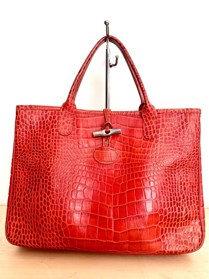 Longchammp Roseau Croc (Category: Luxury Bags & Wallets) located in Quezon City. Submitted by nancdmd (Listing ID 1331871267, Image 1). Description: Longchamp Roseau for sale Short handle Authentic Comes with dustbag and cards lightly used and with minimal flaws .