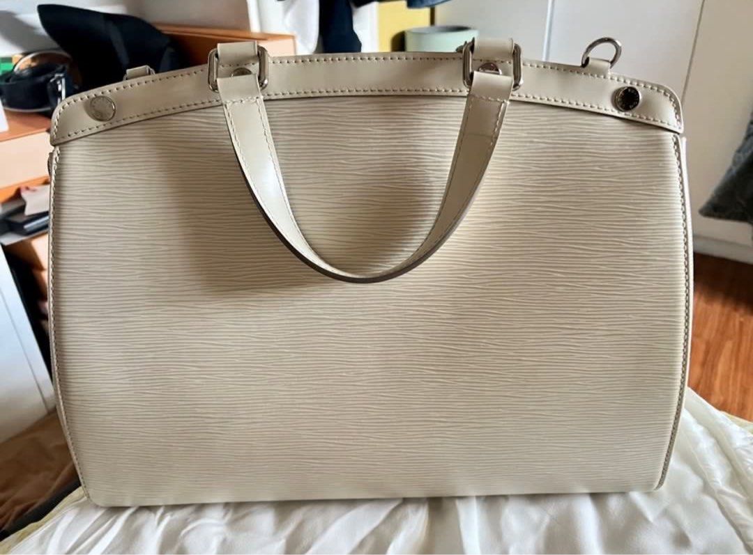 Louis Vuitton (LV) Brea MM (Category: Luxury Bags & Wallets) located in Pasig City. Submitted by wearingthrift (Listing ID 1331922855, Image 2). Description: LOUIS VUITTON (LV) BREA MM Preloved is sold in the market for around PHP50,000-65,000 Can fit a 14” laptop, umbrella, or water tumbler/bottle Classy and minimal luxe item Can be brought to work or as handcarry when traveling Minimal flaws, some signs of usage.