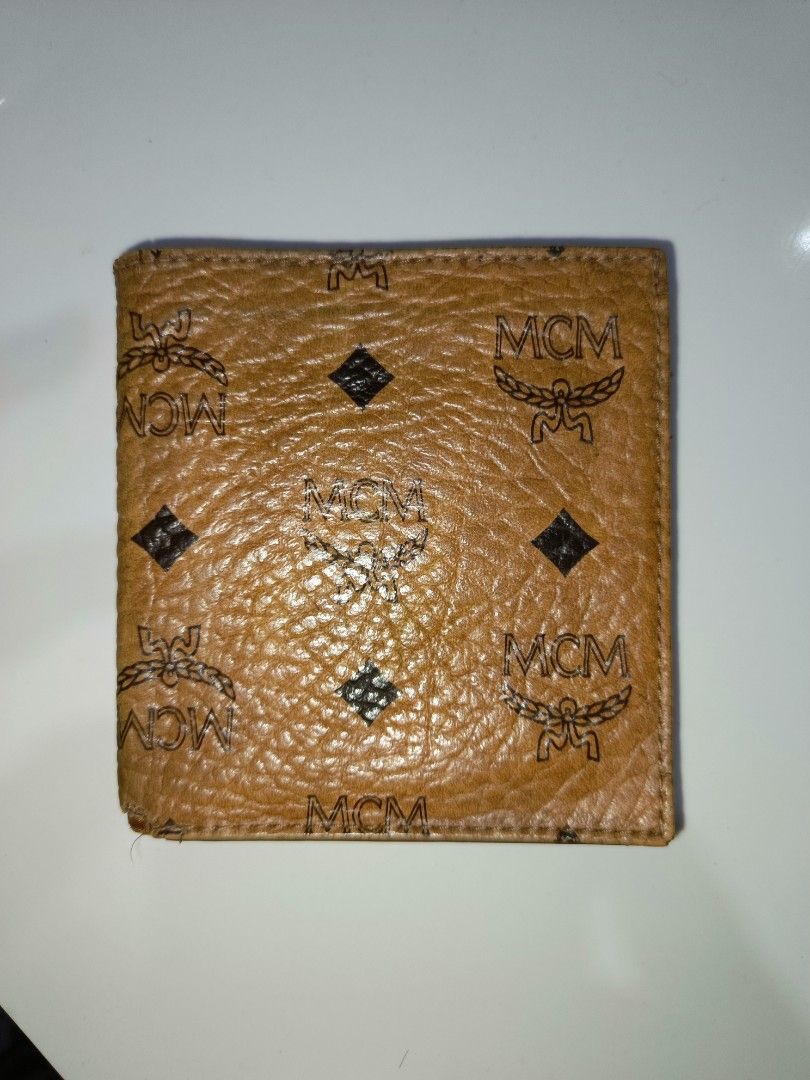 MCM Bi Fold Wallet Cognac Made in Germany (Category: Luxury Bags & Wallets) located in Davao. Submitted by ourvintagelife (Listing ID 1331879537, Image 1). Description: as is project piece.