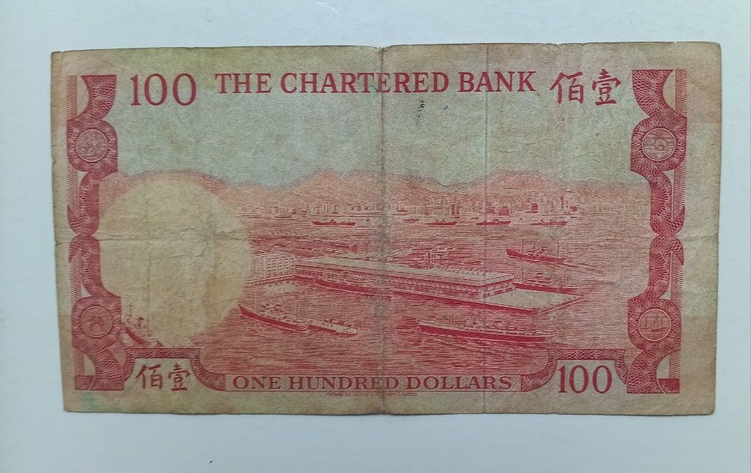 渣打銀行no date（1970-74年）100元（紅屋）一張中品F（F174083