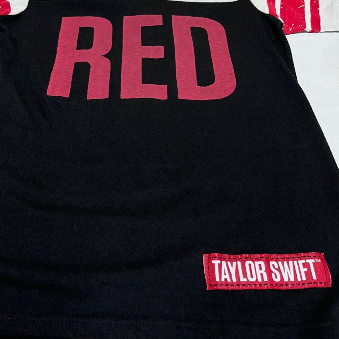 Taylor Swift Red T-Shirt (Category: Shirts) located in Quezon City. Submitted by annmalabanan (Listing ID 1331817730, Image 2). Description: Official Red Tour Merchandise Medium US Women Size Width - 16in Length- 24.5in Never been worn Location: Palmera Homes, Novaliches QC.
