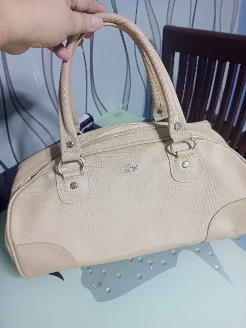 2 Lacoste Original Bag (Category: Tote Bags) located in Valenzuela. Submitted by etzetera26 (Listing ID 1332099170, Image 2). Description: Original Bag Lacoste Beige/navy blue Last price posted.