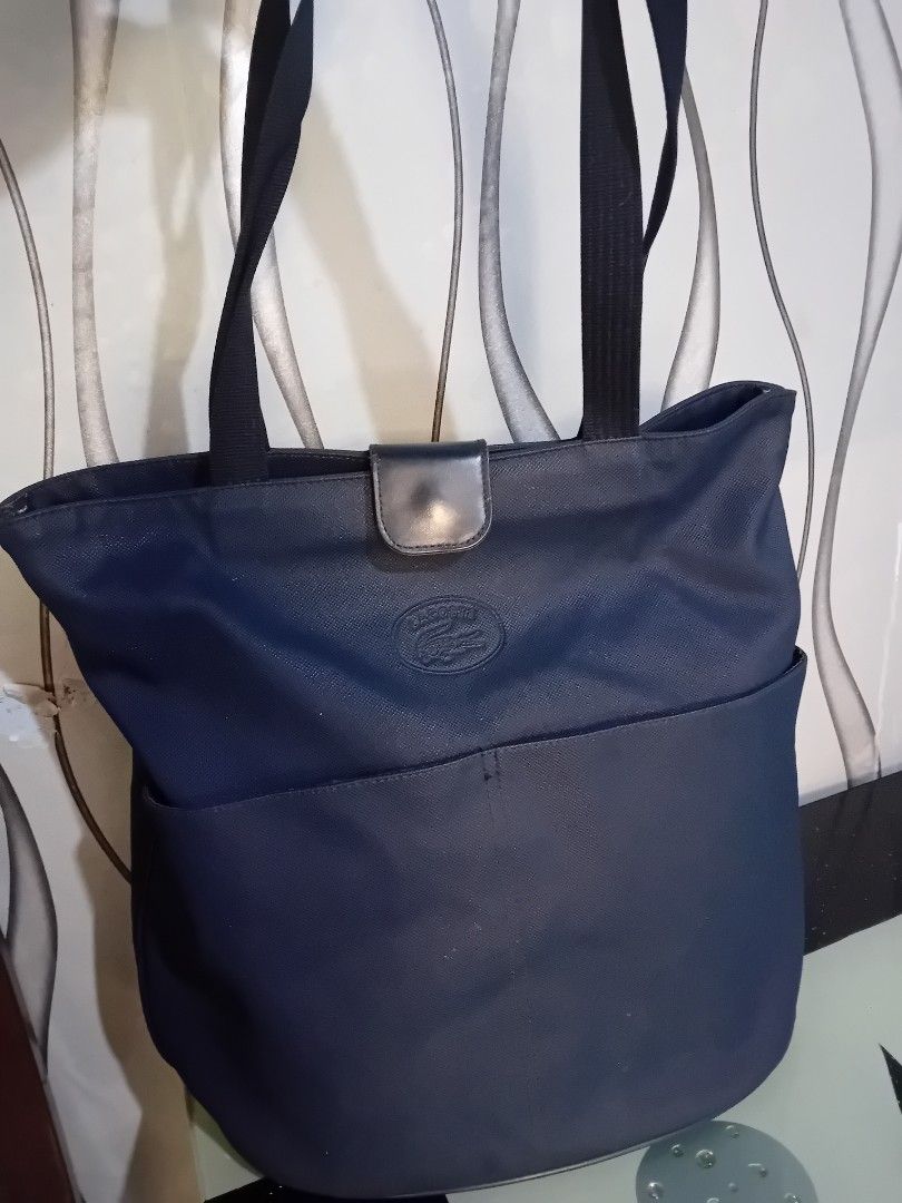 2 Lacoste Original Bag (Category: Tote Bags) located in Valenzuela. Submitted by etzetera26 (Listing ID 1332099170, Image 3). Description: Original Bag Lacoste Beige/navy blue Last price posted.