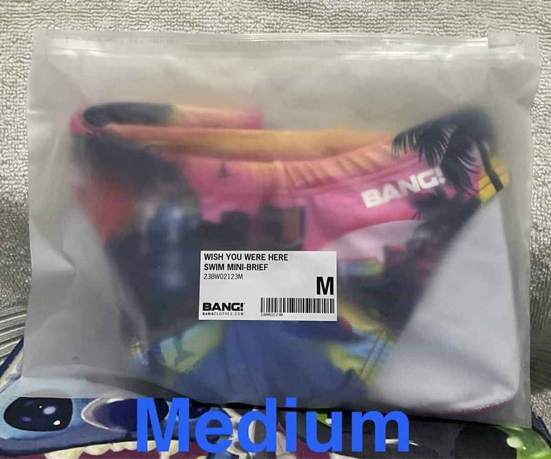 BANG UNDER A NEON SKY - SWIM MINI BRIEF (Category: Swim Trunks & Board Shorts) located in Caloocan City. Submitted by rodelramos.rivera (Listing ID 1332096629, Image 1). Description: BANG!® Swim Mini-Briefs feature an edgier cut that shows more skin with a perfect fit. A ‘minimal’ coverage suit featuring a combo of low-waist cut, a high-leg opening, low-rise seat, and snug fit, to sculpt a man’s waistline to the extreme. A bikini-style bathing su