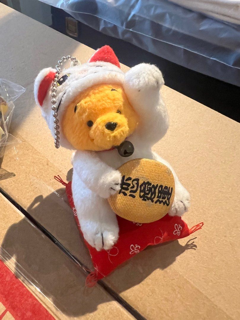 Keychains / Charms (Category: Vintage Collectibles) located in Singapore. Submitted by pinoclover (Listing ID 1331967673, Image 2). Description: Winnie the Pooh in japanese fortune cat outfit. New in box..