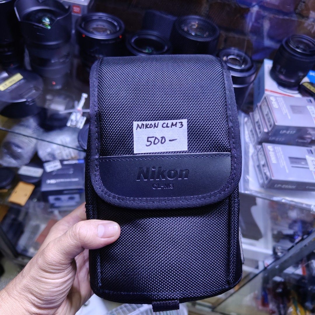 Nikon CLM3 padded lens pouch bag (Category: Camera Bags & Carriers) located in Manila. Submitted by rossinicalabig (Listing ID 1331957778, Image 1). Description: 400 pesos. Nikon CL-M3 lens pouch Very good condition. Check & pickup in Sta.Mesa Mla. Delivery via Lalamove / Grab c/o buyer. Shipping via LBC COP only..