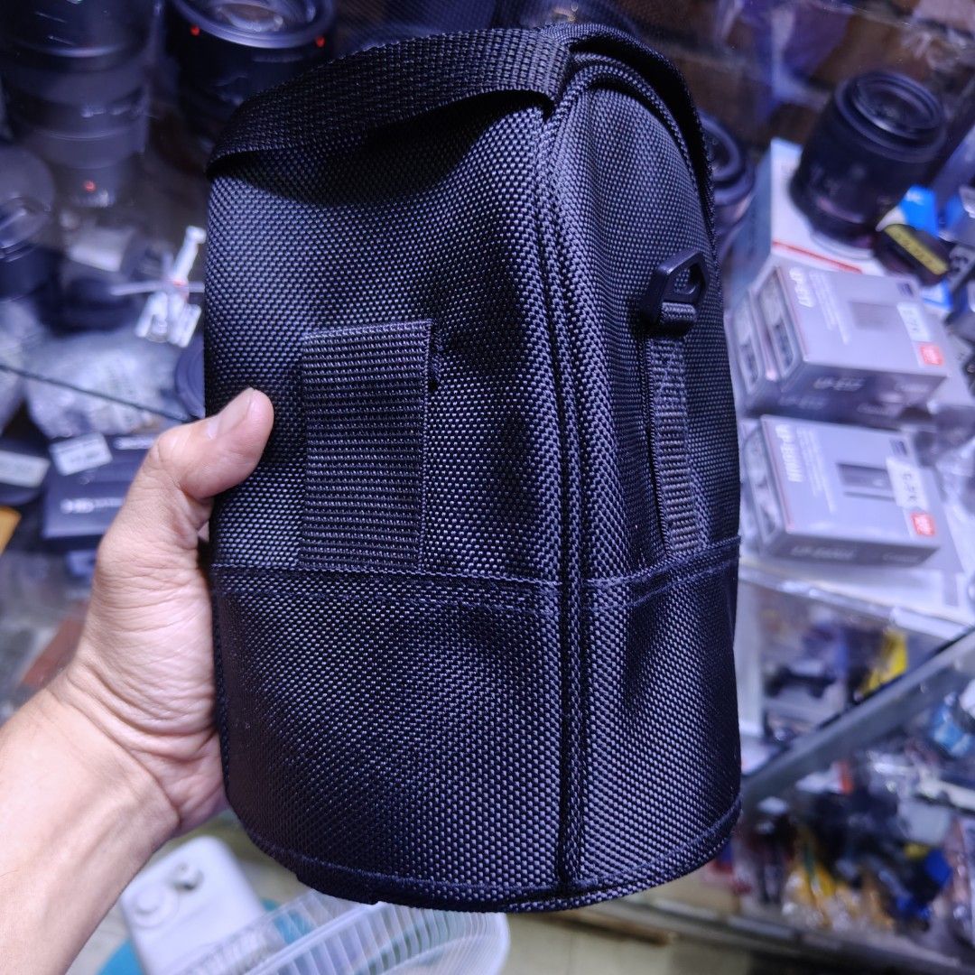 Nikon CLM3 padded lens pouch bag (Category: Camera Bags & Carriers) located in Manila. Submitted by rossinicalabig (Listing ID 1331957778, Image 3). Description: 400 pesos. Nikon CL-M3 lens pouch Very good condition. Check & pickup in Sta.Mesa Mla. Delivery via Lalamove / Grab c/o buyer. Shipping via LBC COP only..