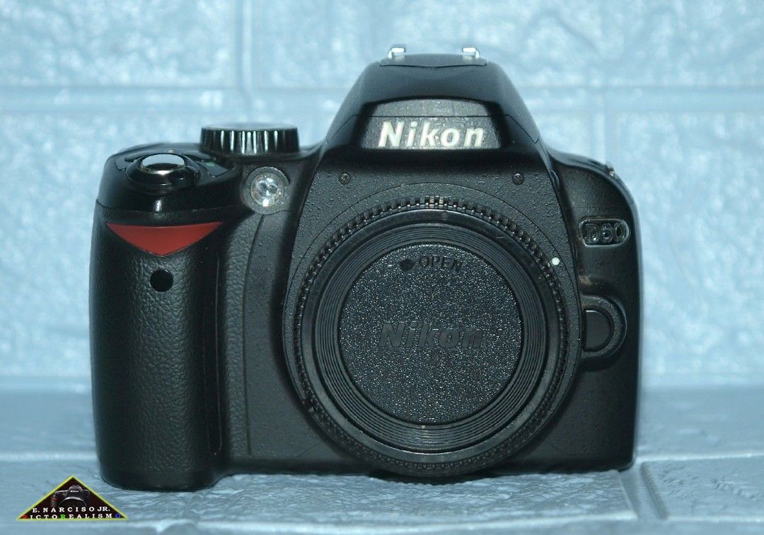 Nikon D60 Camera Body (Category: Cameras) located in Quezon City. Submitted by Mr._Vintageous (Listing ID 1332072554, Image 1). Description: For Sale. Classic CCD Sensor DSLR Camera from Nikon. Nikon D60, 10 Megapixels CCD Sensor. 2.5 inch LCD screen. With Sensor Cleaning Capability. Uses SD Memory Card (not included in package). Built in Flash working. Produces Vibrant Colors. Great all around camera for beginners or advanced shutterbugs. No vig