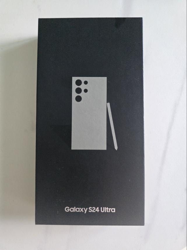 Samsung S24 Ultra (Category: Samsung) located in Quezon City. Submitted by istuffz (Listing ID 1331932705, Image 1). Description: hi im selling samsung s24 ultra 512gb titanium gray NTC unit / open line good as bnew unit complete set with full film protector front and back free 2 spare films for front screen.