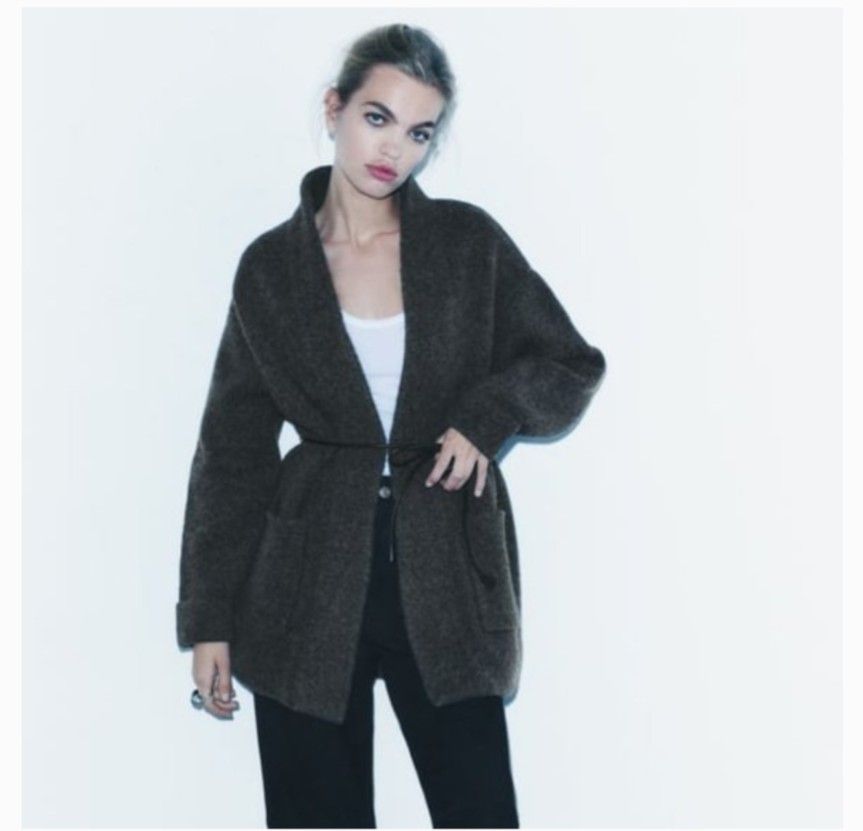 Short Knit Coat (Category: Coats, Jackets and Outerwear) located in Pasig City. Submitted by iamabsoluteva (Listing ID 1332093003, Image 1). Description: Open coat with long turn-up sleeves. Featuring front patch pockets and a thin leather effect belt. Size L (worn once only) 80% wool, 18% polyamide, 2% elastane Worn during winter When worn pics available on request.