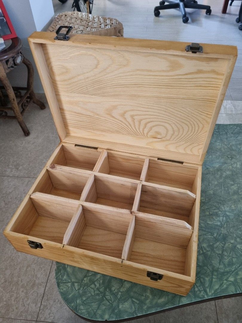 Tea box (Category: Storage Boxes & Baskets) located in Singapore. Submitted by joanathanpillay (Listing ID 1331975310, Image 2). Description: hand crafted tea box for 9 types of tea bags. its hand made from a wine crate. 100% re-cycled. cash and collect from pasir ris or yr nearest mrt station.if payment made in advance by pay now..