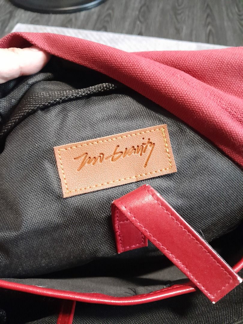 Zero Gravity Red Mono Rucksack / Men's Bag / Men's Backpack (Category: Backpacks) located in Kawit. Submitted by namhyunje (Listing ID 1331964633, Image 3). Description: Zero Gravity Red Mono Rucksack / Men's Bag / Men's Backpack Rucksack made from red canvas textile and red synthetic leather. Main inner compartment with zipper closure, inside pocket and laptop sleeve pocket, double magnetic strap closure, adjustable leather shoulder straps with 